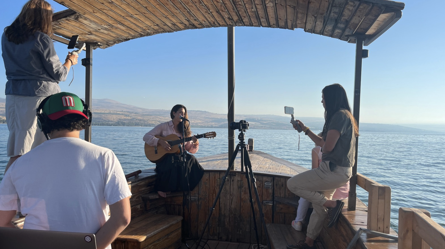 Mariana recording music overlooking the Sea of Galilee